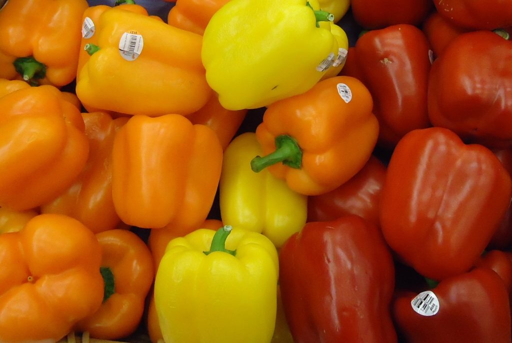 Red, yellow and orange capsicums